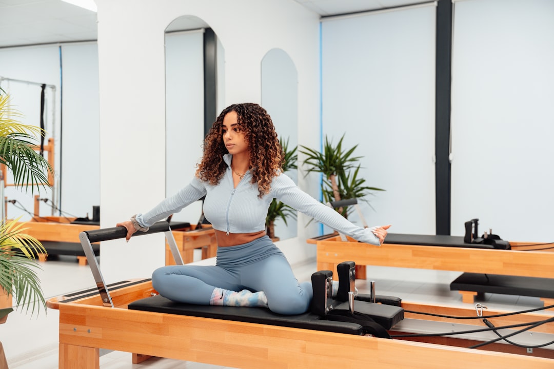 a-woman-sitting-on-a-piyor-in-a-room-wiy6lqelypk